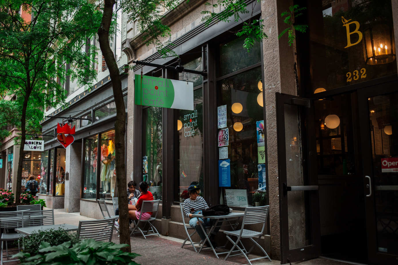 Exterior, sidewalk tables and seats